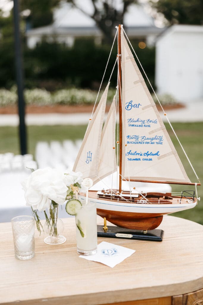 Image of model sailboat being used as a bar sign for a wedding reception